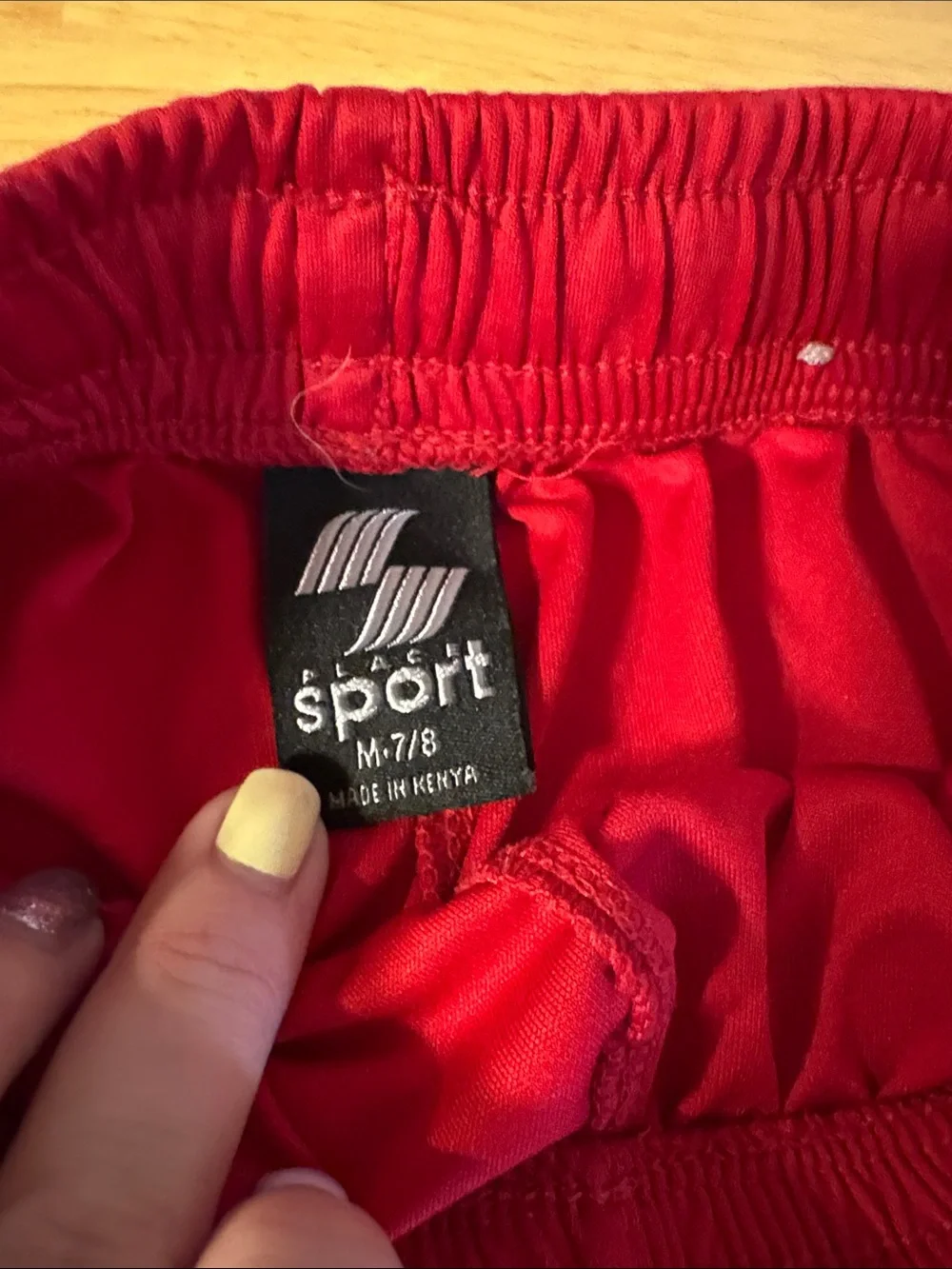 Sporto Red Athletic Shorts with Patterned Hem